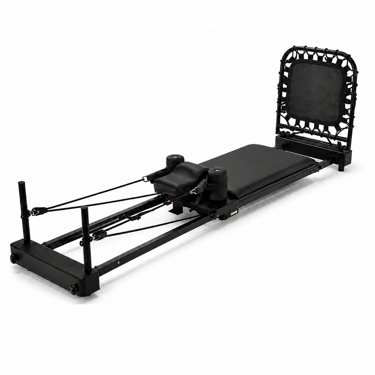 A black Pilates reformer machine with an attached bungee trampoline backrest, featuring padded foam surfaces and resistance cords, photographed on a clean white background.