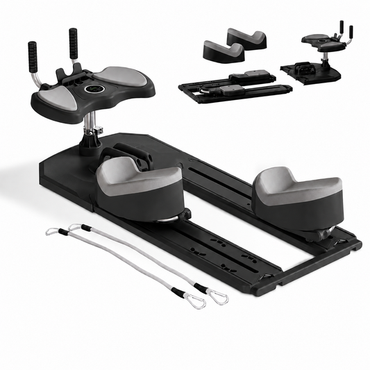 A black and gray Pilates reformer machine shown on a white background, with accessories including resistance bands and separate handle/foot pad components arranged above it.